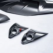 DRY CARBON FRONT BUMPER AIR INTAKE COVERS for LAMBORGHINI REVUELTO 2023+ FORZA PERFORMANCE custom fit Mansory Style

Set includes:
Front Bumper Air Intake Covers

Material: Dry Carbon

NOTE: Professional installation is required.