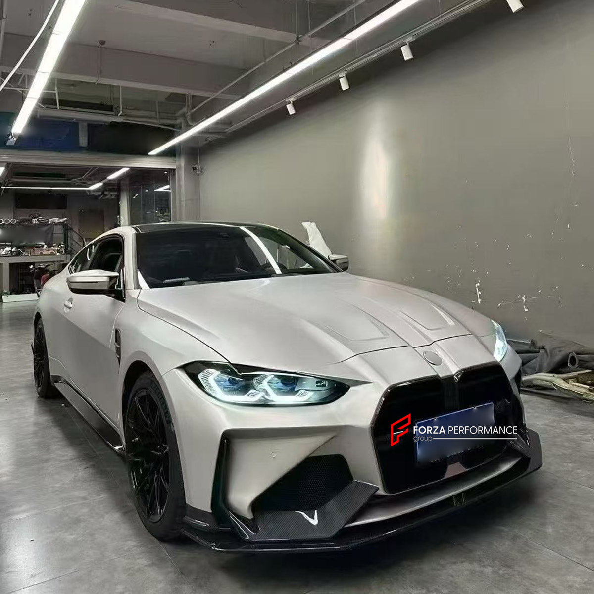 DRY CARBON FRONT BUMPER AND FRONT LIP for BMW M3 G80 M4 G82 G83 2020+ FORZA PERFORMANCE custom fit Adro Style

Set includes:
Front Lip
Front Bumper Assembly

Material: Dry Carbon

NOTE: Professional installation is required.
