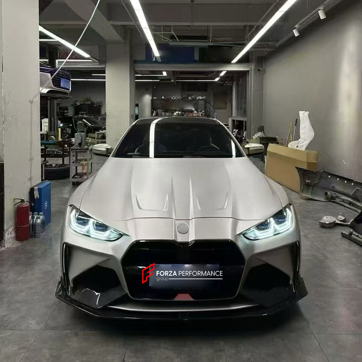 DRY CARBON FRONT BUMPER AND FRONT LIP for BMW M3 G80 M4 G82 G83 2020+ FORZA PERFORMANCE custom fit Adro Style

Set includes:
Front Lip
Front Bumper Assembly

Material: Dry Carbon

NOTE: Professional installation is required.