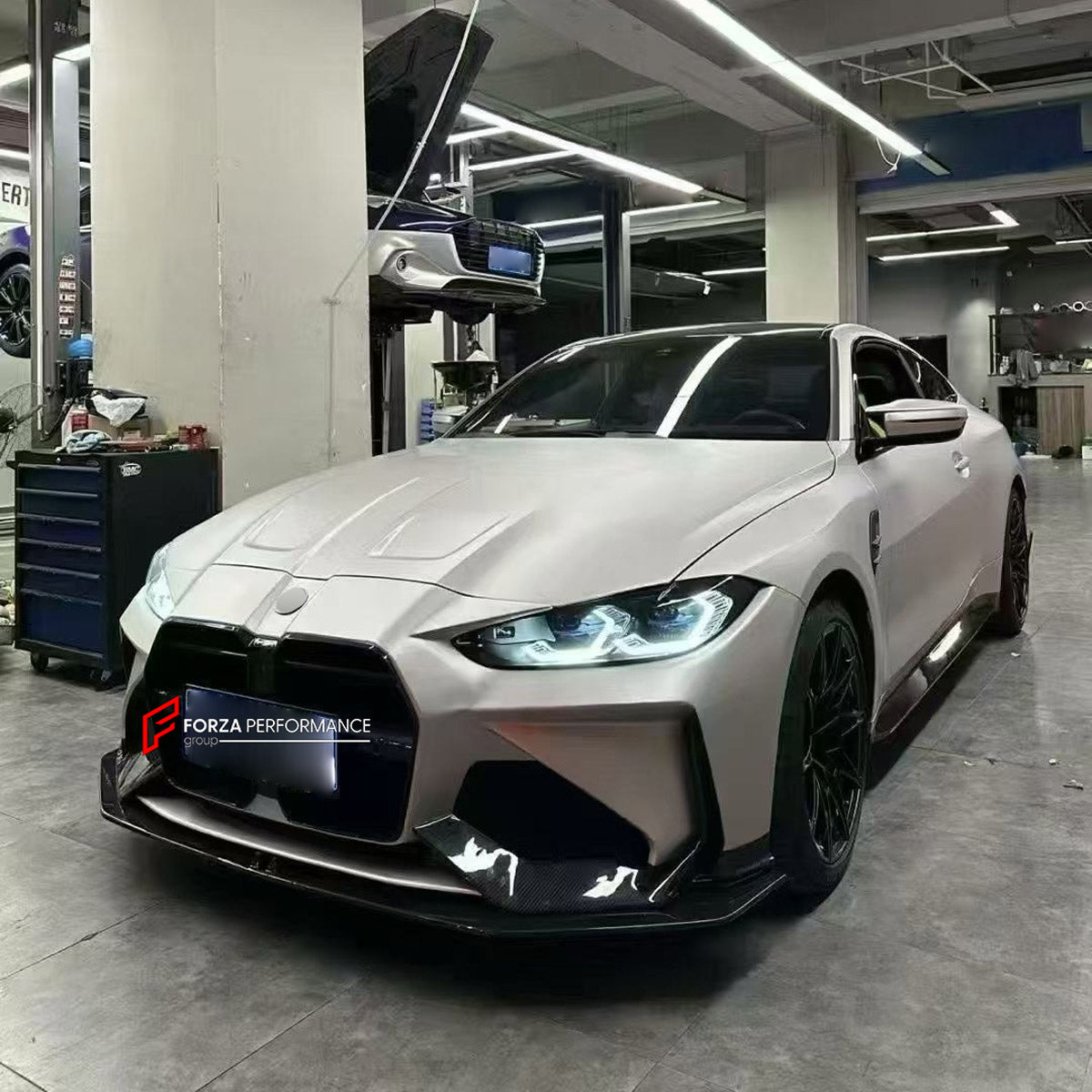 DRY CARBON FRONT BUMPER AND FRONT LIP for BMW M3 G80 M4 G82 G83 2020+ FORZA PERFORMANCE custom fit Adro Style

Set includes:
Front Lip
Front Bumper Assembly

Material: Dry Carbon

NOTE: Professional installation is required.