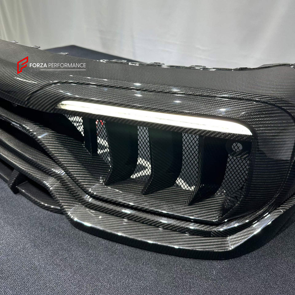 DRY CARBON FRONT BUMPER ASSEMBLY for MERCEDES-BENZ G-CLASS W464 W465 G350 G500 G63 2018+ FORZA PERFORMANCE custom fit TC Style

Set includes:
Front Bumper Assembly

Material: Dry Carbon

NOTE: Professional installation is required.