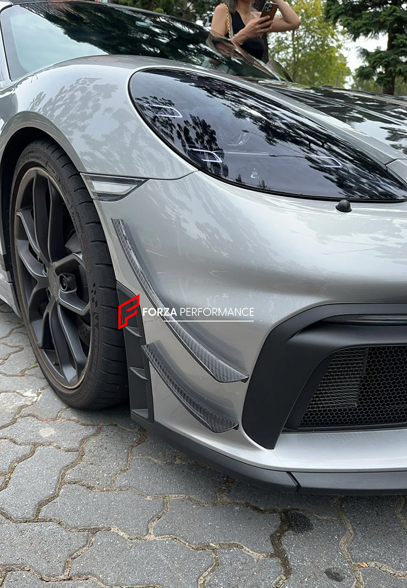 DRY CARBON FRONT BUMPER CANARDS for PORSCHE 718 982 GT4 2016+

Set includes:

Front Bumper Canards

Material: Dry Carbon

Note: Professional installation is required