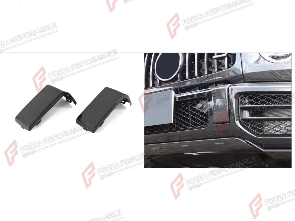 DRY CARBON FRONT BUMPER COVER TRIMS for MERCEDES-BENZ G-CLASS W464 G63 2019 - 2024 FORZA PERFORMANCE custom fit JCW Style

Set includes:
Front Bumper Cover Trims

Material: Dry Carbon

NOTE: Professional installation is required.