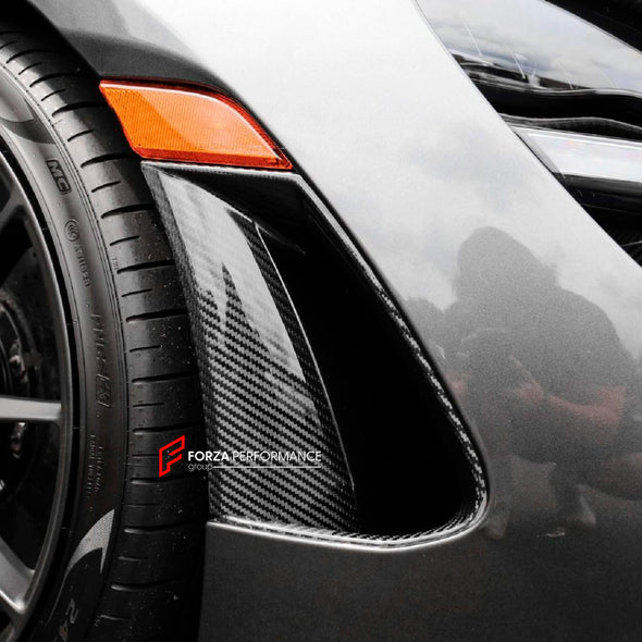 DRY CARBON FRONT BUMPER SIDE AIR INLET for MCLAREN 720 S 765LT

Set includes:

Front Bumper Air Inlets

Material: Carbon Fiber

Note: Professional installation is required

CONTACT US FOR PRICING