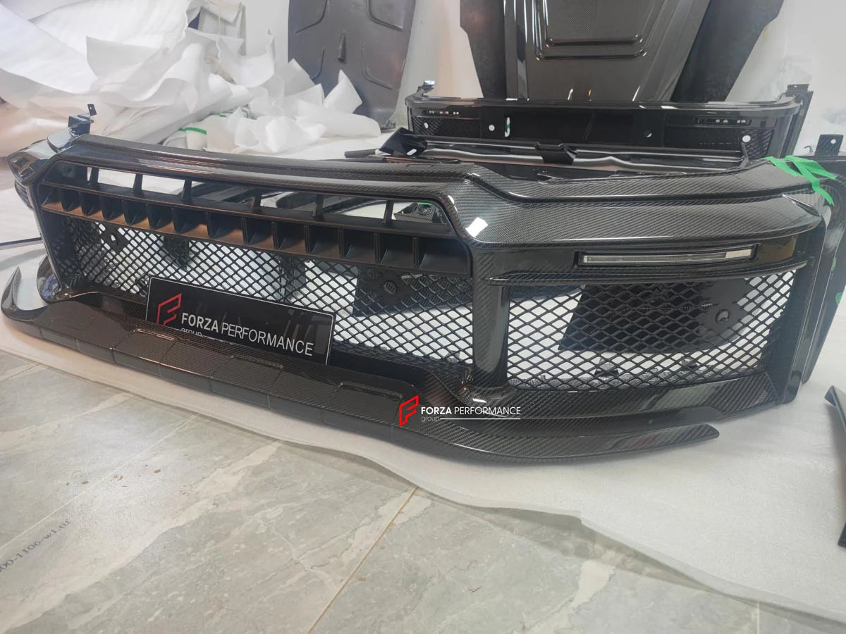 DRY CARBON FRONT BUMPER WITH LIP for MERCEDES BENZ AMG G63 W465 G350 G500 G550 AMG G63 2024+

Set includes:

Front Lip
Front Bumper

Material: Dry carbon

NOTE: Professional installation is required