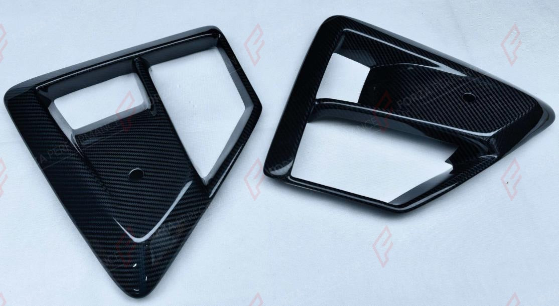 DRY CARBON FRONT CANARDS for BMW X5M F95 X6M F96 LCI 2023+
Set includes:

Front Canards
Material: Dry Carbon

NOTE: Add-on type - installs over the original part. Professional installation is required.