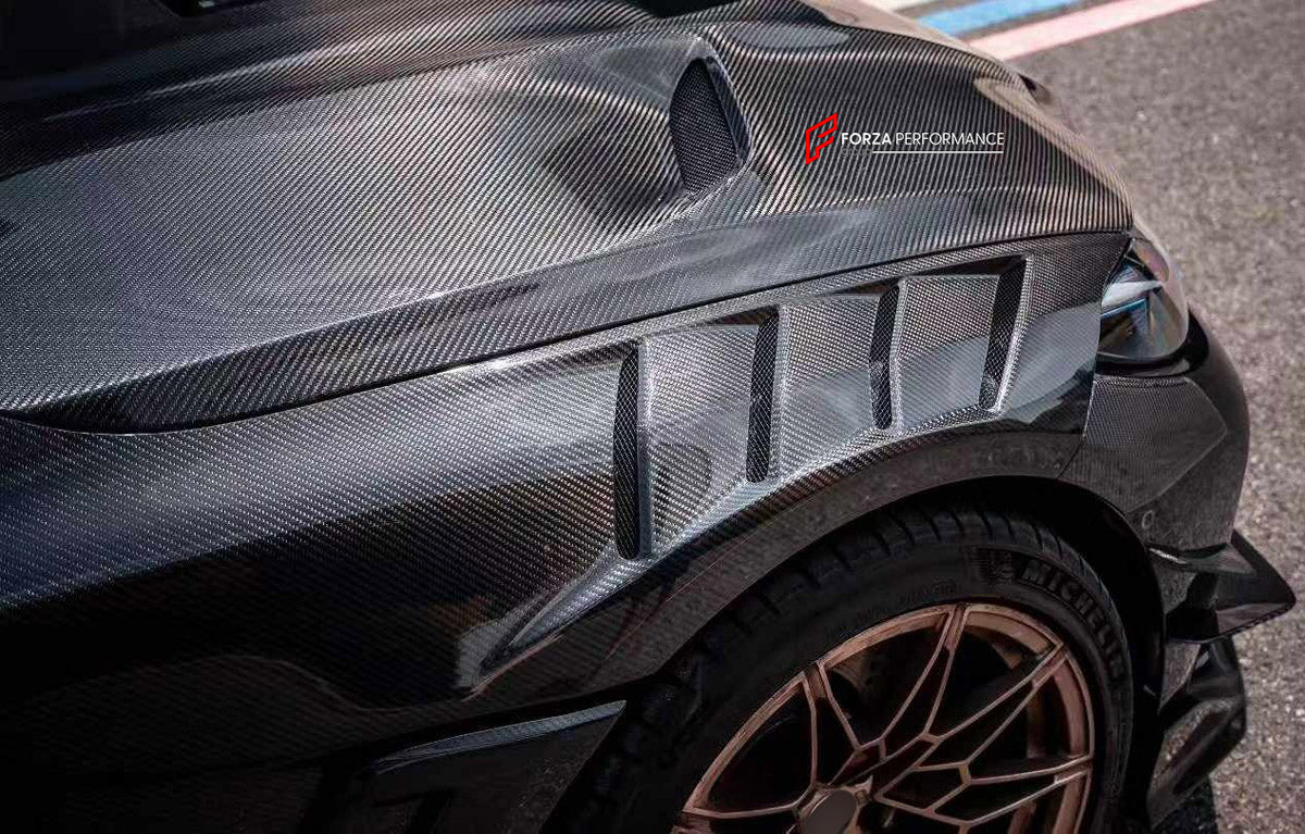 DRY CARBON FRONT FENDERS AND HOOD BONNET for BMW M3 G80 2020+

Set includes:
Hood Bonnet
Front Fenders

Material: Dry Carbon, Tempered Glass

NOTE: Professional installation is required.