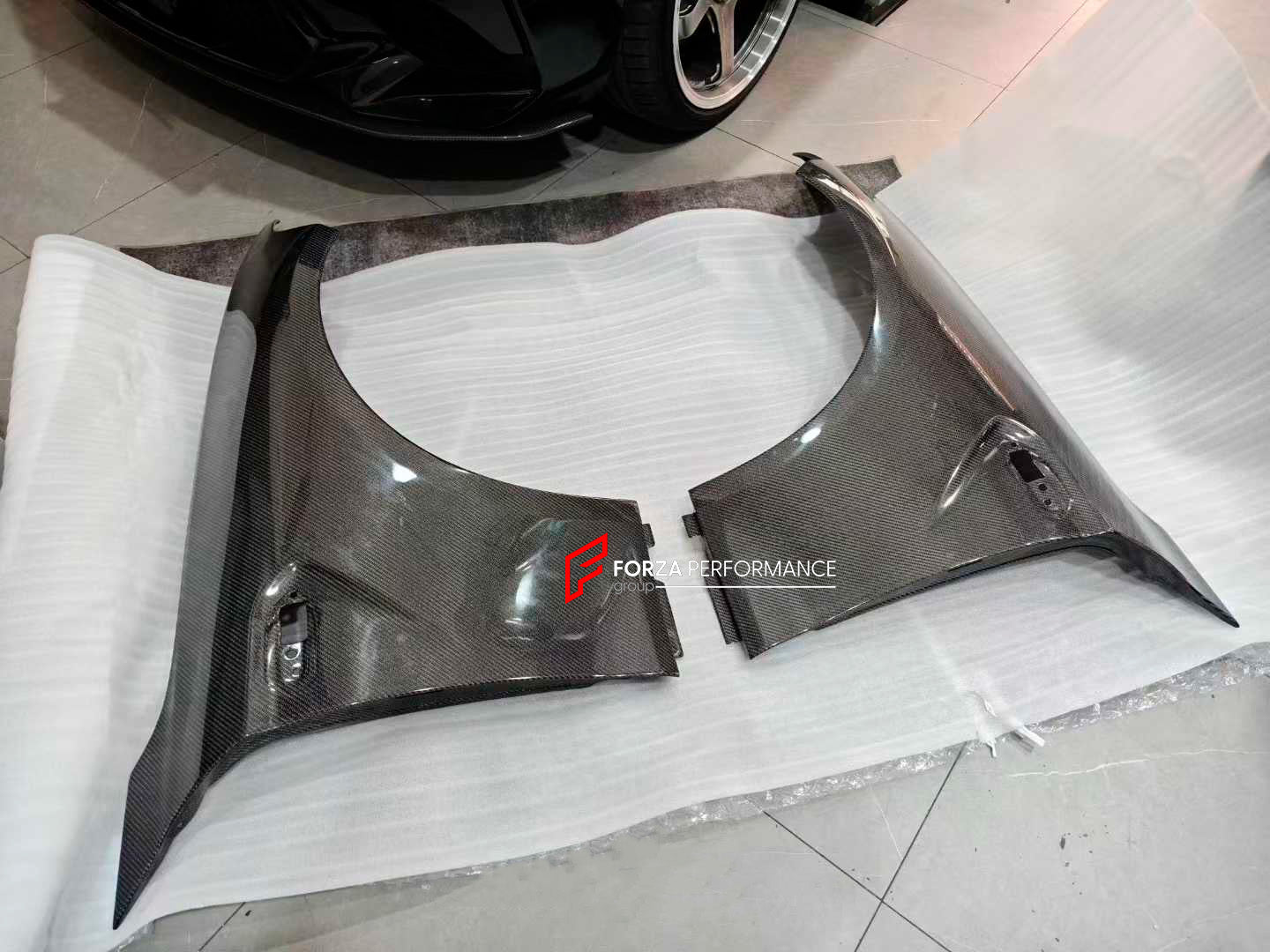DRY CARBON FRONT FENDERS for BMW M2 COMPETITION F87 2015 - 2021

Set includes:

Front Fenders

Material: Dry Carbon

NOTE: Professional installation is required