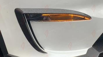 DRY CARBON FRONT FOG LIGHT CANARDS for TESLA MODEL X 2022+
Set includes:

Front Fog Light Canards
Material: Dry Carbon

NOTE: Add-on type - installs over the original part. Professional installation is required.
