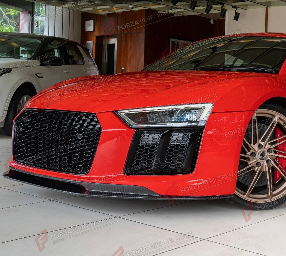 DRY CARBON FRONT LIP for AUDI R8 V10 GT GEN 2 2016 - 2019 FORZA PERFORMANCE Custom Fit
Set includes:

Front Lip
Material: Dry Carbon

NOTE: Professional installation is required.

Why “Contact Us for Pricing”?
We don’t display fixed prices because our goal is to offer you the most competitive deal possible. Product costs often decrease over time, and by requesting a quote, you’ll receive our most up-to-date price on market.

SECURED PAYMENT METHODS
PayPal (+4.4% fee)
Visa / Mastercard / American Express (th