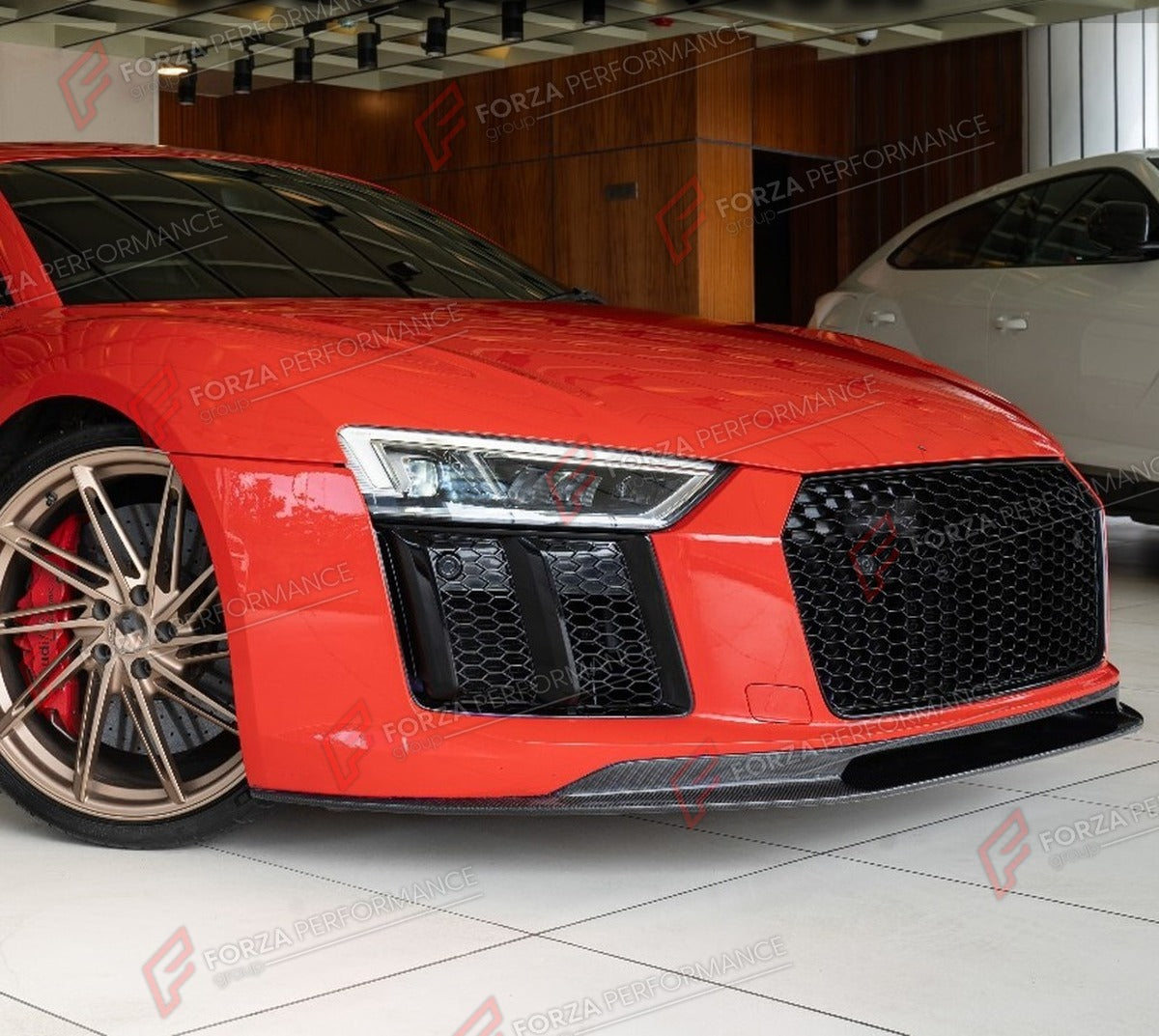 DRY CARBON FRONT LIP for AUDI R8 V10 GT GEN 2 2016 - 2019 FORZA PERFORMANCE Custom Fit
Set includes:

Front Lip
Material: Dry Carbon

NOTE: Professional installation is required.

Why “Contact Us for Pricing”?
We don’t display fixed prices because our goal is to offer you the most competitive deal possible. Product costs often decrease over time, and by requesting a quote, you’ll receive our most up-to-date price on market.

SECURED PAYMENT METHODS
PayPal (+4.4% fee)
Visa / Mastercard / American Express (th