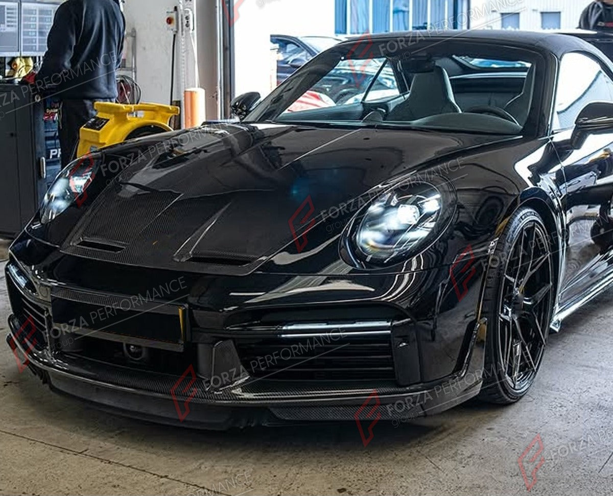 DRY CARBON FRONT LIP for PORSCHE 911 992 TURBO S 2019 - 2023 FORZA PERFORMANCE Custom Fit
Set includes:

Front Lip
Material: Dry Carbon

NOTE: Professional installation is required.

Why “Contact Us for Pricing”?
We don’t display fixed prices because our goal is to offer you the most competitive deal possible. Product costs often decrease over time, and by requesting a quote, you’ll receive our most up-to-date price on market.

SECURED PAYMENT METHODS
PayPal (+4.4% fee)
Visa / Mastercard / American Express 