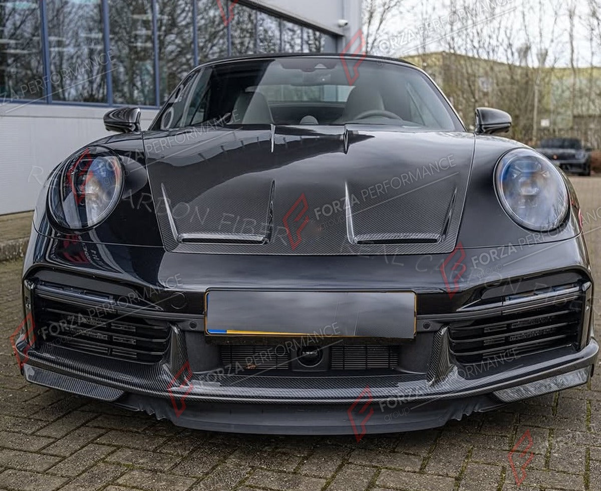 DRY CARBON FRONT LIP for PORSCHE 911 992 TURBO S 2019 - 2023 FORZA PERFORMANCE Custom Fit
Set includes:

Front Lip
Material: Dry Carbon

NOTE: Professional installation is required.

Why “Contact Us for Pricing”?
We don’t display fixed prices because our goal is to offer you the most competitive deal possible. Product costs often decrease over time, and by requesting a quote, you’ll receive our most up-to-date price on market.

SECURED PAYMENT METHODS
PayPal (+4.4% fee)
Visa / Mastercard / American Express 