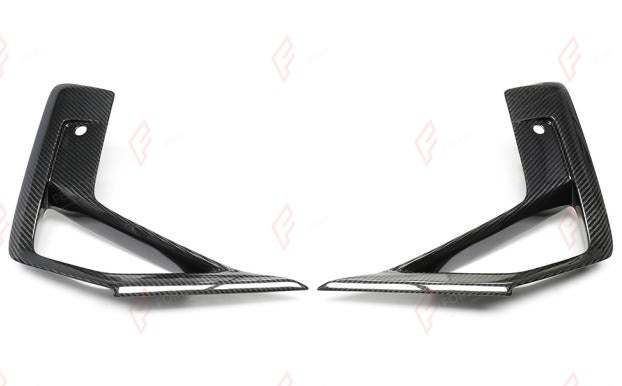 DRY CARBON FRONT SIDE DUCTS for BMW X3M F97 X4M F98 LCI 2021 - 2024
Set includes:

Front Side Ducts
Material: Dry Carbon

NOTE: Add-on type - installs over the original part. Professional installation is required.