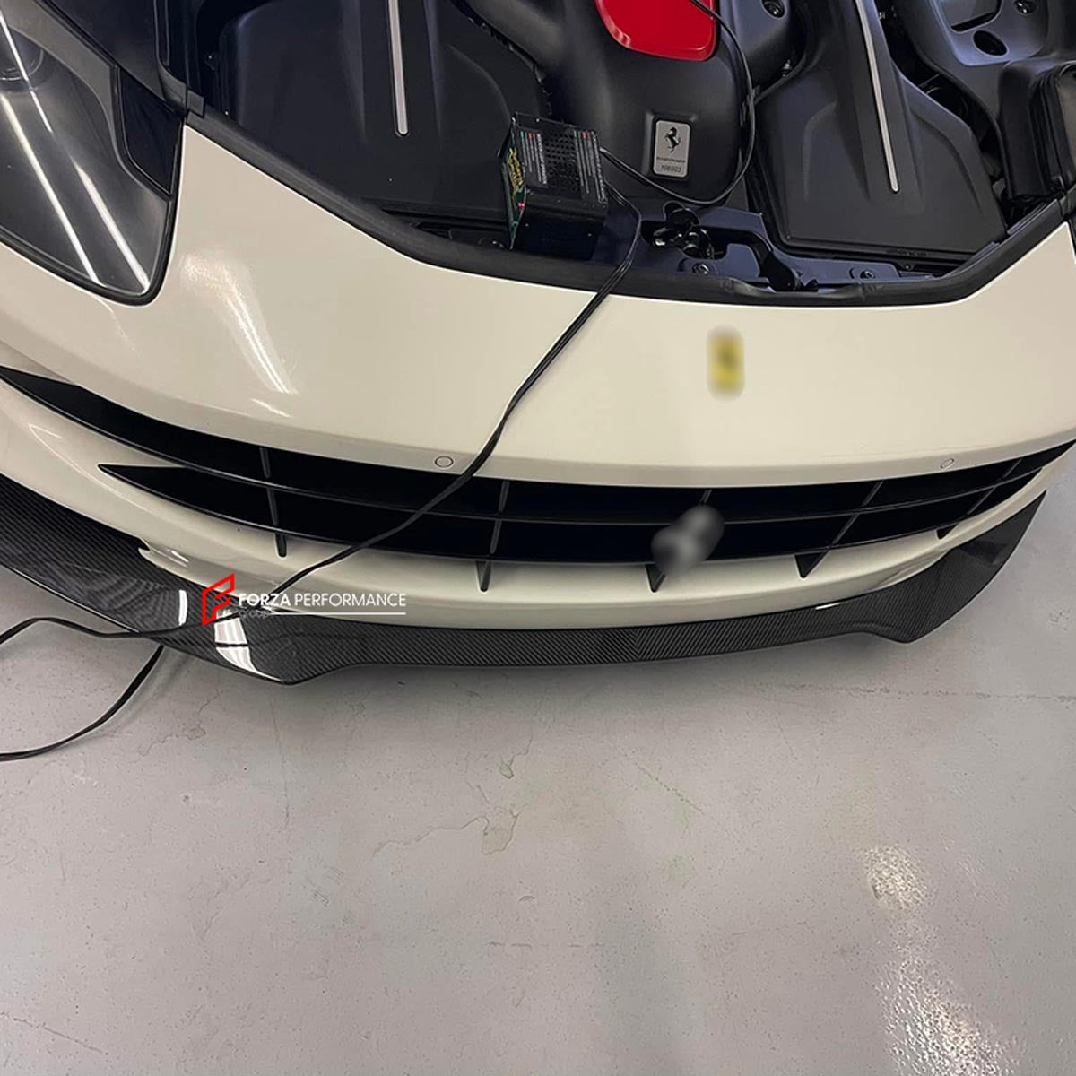 DRY CARBON FRONT LIP for FERRARI FF 2011 - 2016
Set includes:

Front Lip
Material: Dry Carbon

NOTE: Professional installation is required.