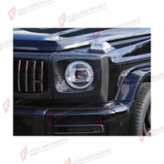 DRY CARBON HEADLIGHT COVERS for MERCEDES-BENZ G-CLASS W464 2019 - 2024 FORZA PERFORMANCE custom fit JCW Style

Set includes:
Headlight Covers

Material: Dry Carbon

NOTE: Professional installation is required.