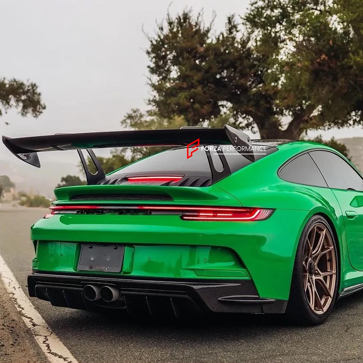 DRY CARBON WING SPOILER for PORSCHE 911 992 GT3 2022+
Set includes:

Rear GT Wing
Swan Neck Wing Uprights (2 Pieces)
Wing Mounting Base Plates (2 Pieces)
Wing End Caps (2 Pieces)
Mounting Hardware
Material: Dry Carbon

NOTE: Professional installation is required. For Track GT3 GT4.