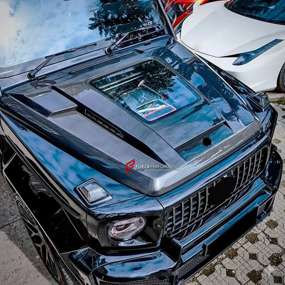DRY CARBON Hood Bonnet for Mercedes Benz G Class W464 2018 - 2024
Set includes:

Hood Bonnet
Material: Dry Carbon

NOTE: Professional installation is required.