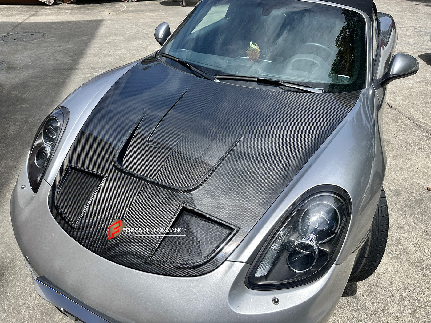 CARBON FIBER HOOD BONNET for PORSCHE 718 981 982 CAYMAN BOXSTER 2012+

Set includes:

Hood Bonnet

Fitment models:

Boxster III (981) 2012 - 2016
Cayman II (981) 2014 - 2016
718 I (982) 2017+

Material: Dry Carbon

Note: Professional installation is required