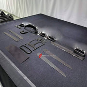 Dry Carbon Interior Kit for Lamborghini Urus 2018+
Set includes:

Dashboard Panel Cover
Meter Base Panel Cover
Central Control Panel Trim
Center Console Air Outlet Cover Trim
Material: Dry Carbon

NOTE: Professional installation is required.