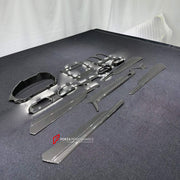DRY CARBON INTERIOR KIT for LAMBORGHINI URUS 2018+

Set includes:
Dashboard Instrument Cluster Trim
Dashboard Panel Cover
Meter Base Panel Cover
Central Control Panel Trim
Center Console Air Outlet Cover Trim
Dashboard Trim Kit
Interior Door Panel Trim

Material: Dry Carbon

NOTE: Professional installation is required.