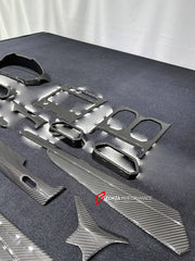 DRY CARBON INTERIOR KIT for LAMBORGHINI URUS 2018+

Set includes:
Dashboard Instrument Cluster Trim
Dashboard Panel Cover
Meter Base Panel Cover
Central Control Panel Trim
Center Console Air Outlet Cover Trim
Dashboard Trim Kit
Interior Door Panel Trim

Material: Dry Carbon

NOTE: Professional installation is required.