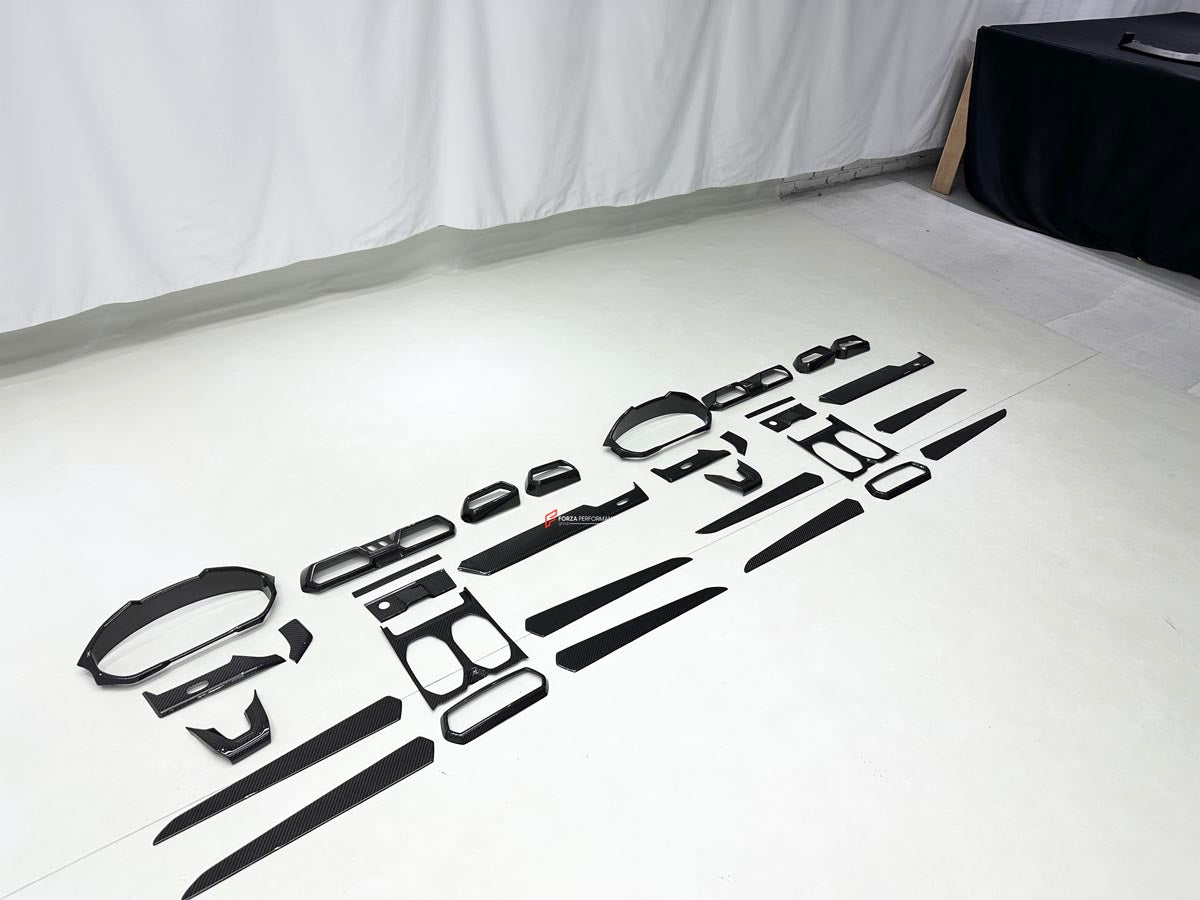 DRY CARBON INTERIOR KIT for Lamborghini Urus SE 2024+
Set includes:

Dashboard Instrument Cluster Trim
Center Console Trim Cover
Rear Center Console Air Vent Cover
Dashboard Trim Kit
Dashboard Side Air Vents Covers
Interior Door Panel Trim
Material: Dry Carbon

NOTE: Professional installation is required.