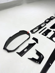 DRY CARBON INTERIOR KIT for Lamborghini Urus SE 2024+
Set includes:

Dashboard Instrument Cluster Trim
Center Console Trim Cover
Rear Center Console Air Vent Cover
Dashboard Trim Kit
Dashboard Side Air Vents Covers
Interior Door Panel Trim
Material: Dry Carbon

NOTE: Professional installation is required.