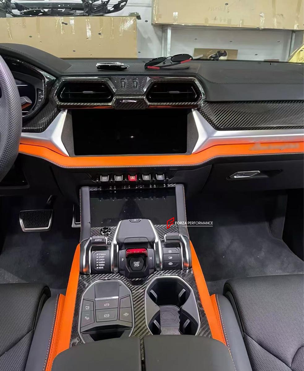 DRY CARBON INTERIOR KIT for Lamborghini Urus SE 2024+
Set includes:

Dashboard Instrument Cluster Trim
Center Console Trim Cover
Rear Center Console Air Vent Cover
Dashboard Trim Kit
Dashboard Side Air Vents Covers
Interior Door Panel Trim
Material: Dry Carbon

NOTE: Professional installation is required.