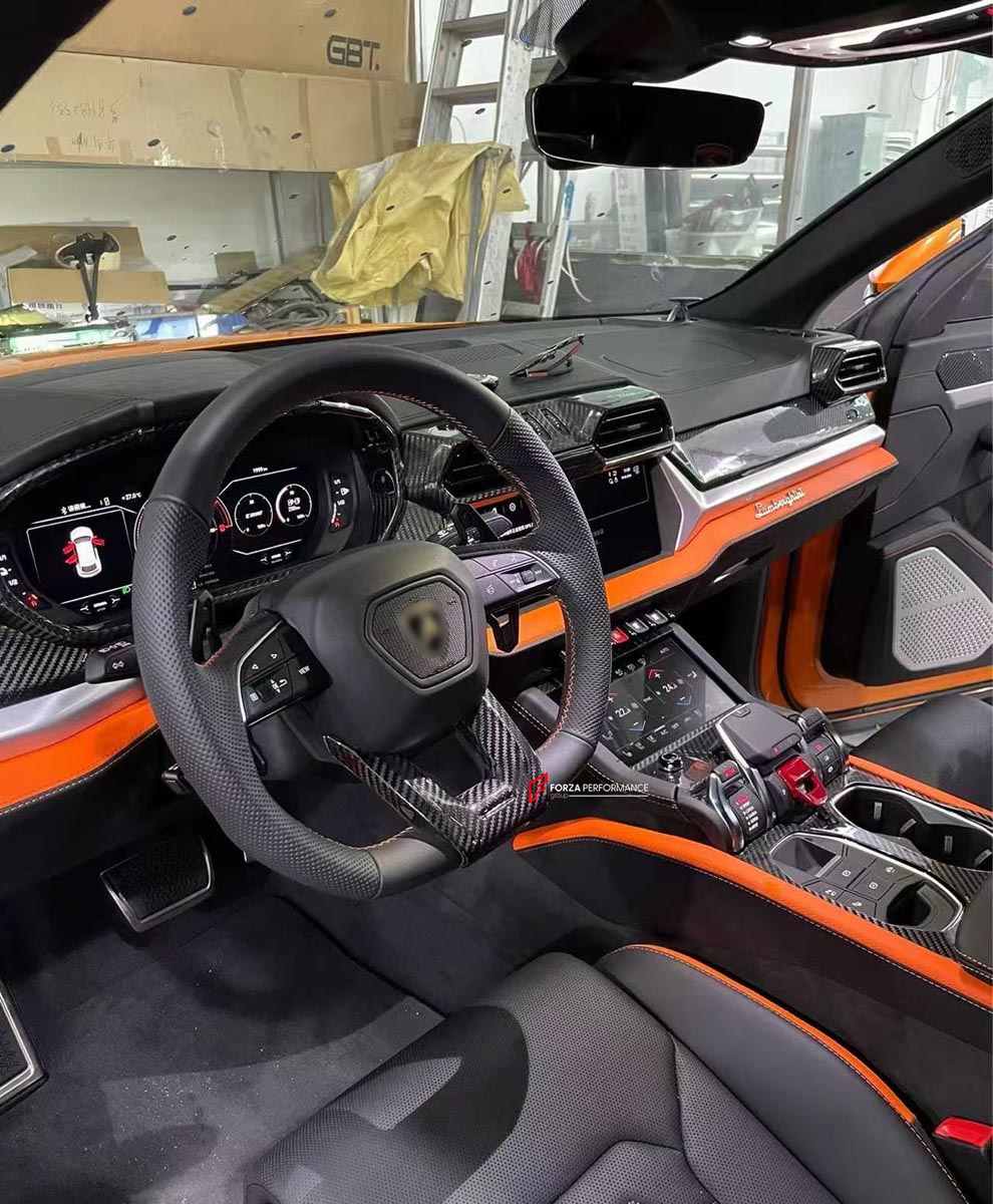 DRY CARBON INTERIOR KIT for Lamborghini Urus SE 2024+
Set includes:

Dashboard Instrument Cluster Trim
Center Console Trim Cover
Rear Center Console Air Vent Cover
Dashboard Trim Kit
Dashboard Side Air Vents Covers
Interior Door Panel Trim
Material: Dry Carbon

NOTE: Professional installation is required.