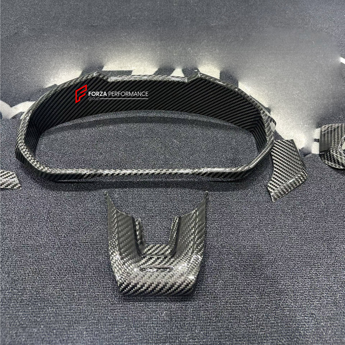 DRY CARBON INTERIOR KIT for LAMBORGHINI URUS SE 2024+

Set includes:
Dashboard Instrument Cluster Trim
Center Console Trim Cover
Rear Center Console Air Vent Cover
Dashboard Trim Kit
Dashboard Side Air Vents Covers
Interior Door Panel Trim

Material: Dry Carbon

NOTE: Professional installation is required.