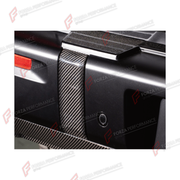 DRY CARBON REAR BUMPER COVER TRIMS for MERCEDES-BENZ G-CLASS W465 G63 G450D G500 G550 2025+

Set includes:
Rear Bumper Cover Trims

Material: Dry Carbon

NOTE: Professional installation is required.