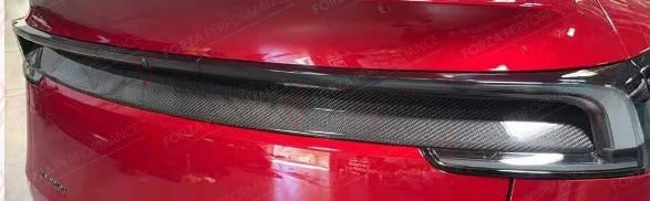 DRY CARBON REAR BUMPER TRIM for TESLA MODEL Y JUNIPER 2025+
Set includes:

Rear Bumper Trim
Material: Dry Carbon

NOTE: Add-on type - installs over the original part. Professional installation is required.