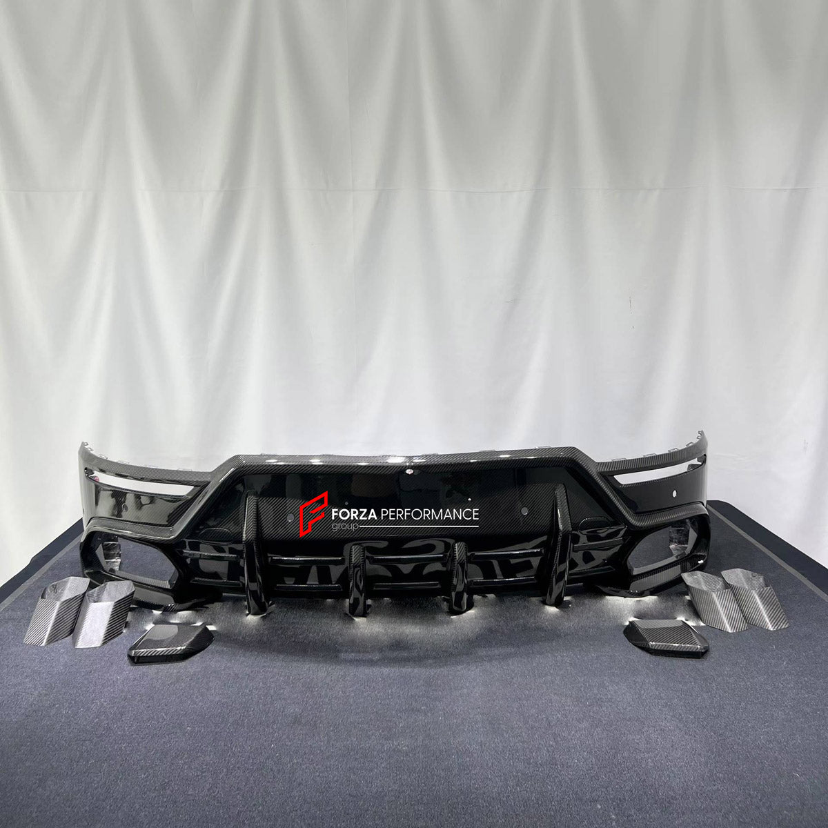 DRY CARBON REAR DIFFUSER AND EXHAUST TIPS for LAMBORGHINI URUS SE 2024+ FORZA PERFORMANCE custom fit U Style

Set includes:
Rear Diffuser
Exhaust Tips

Material: Dry Carbon

NOTE: Professional installation is required.