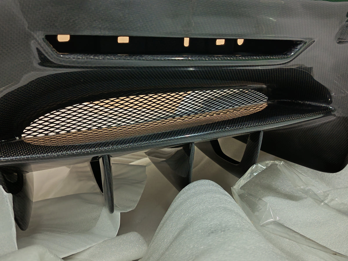 DRY CARBON REAR DIFFUSER for FERRARI SF90 2019+
Set includes:

Rear Diffuser
Material: Dry Carbon

NOTE: Professional installation is required.