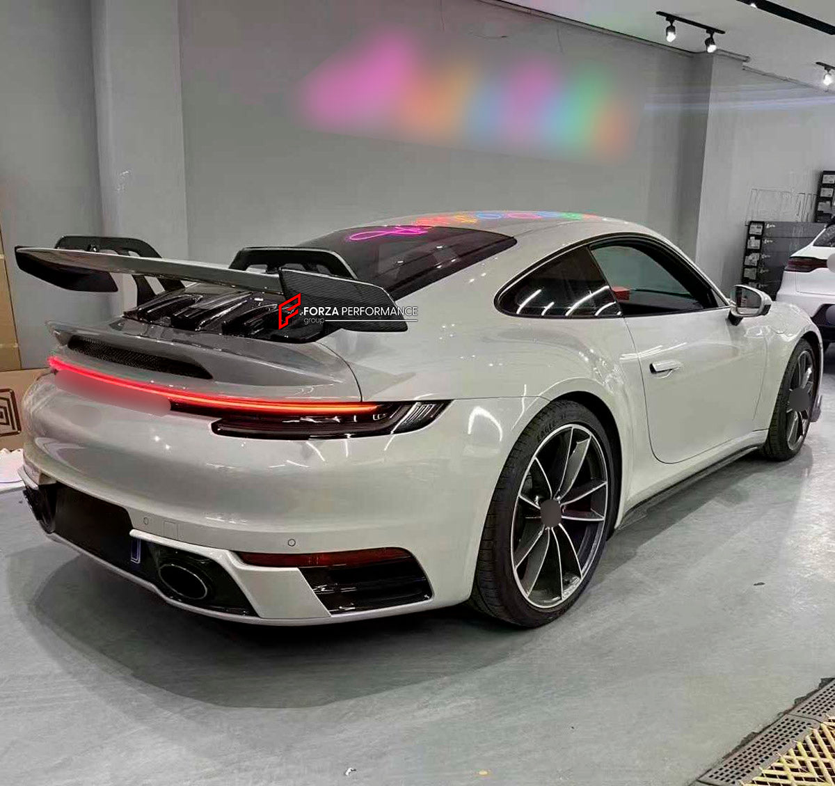 DRY CARBON Rear Spoiler Wing for Porsche 911 992 GT3 2019+
Set includes:

Rear Spoiler Wing
Material: Dry Carbon

NOTE: Professional installation is required.