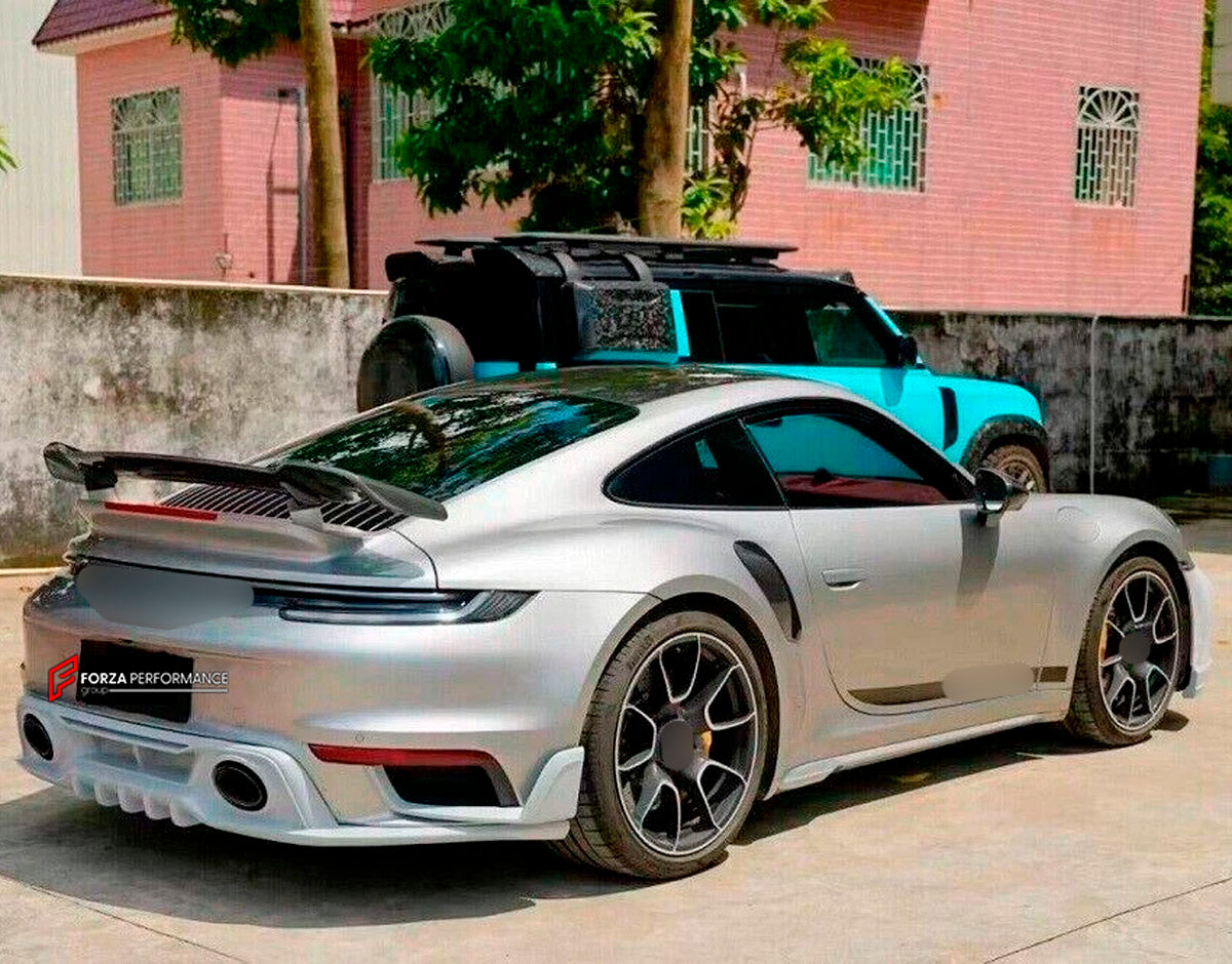 DRY CARBON Rear Spoiler Wing for Porsche 911 992 Turbo 2019+
Set includes:

Rear Spoiler Wing
Material: Dry Carbon

NOTE: Professional installation is required.