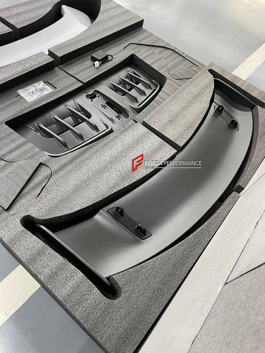 DRY CARBON REAR WING SPOILER with ENGINE LID for PORSCHE 911 992.2 CARRERA 2025+ upgrade to GT3

Set includes:

Rear Wing Spoiler

Rear Duck Spoiler
Engine Lid

Material: Dry Carbon

NOTE: Engine Lid is required for Spoiler to be installed. Professional installation is required

CONTACT US FOR PRICING