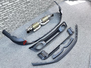 DRY CARBON REPLACEMENT BODY KIT for PORSCHE 911 992.2 CARRERA COUPE S T 4S 2024+ Forza Performance Custom fit

Set includes:
Front Lip
Front Bumper Air Vent Trim
Rear Diffuser
Exhaust System

Material: Dry Carbon

NOTE: Professional installation is required.