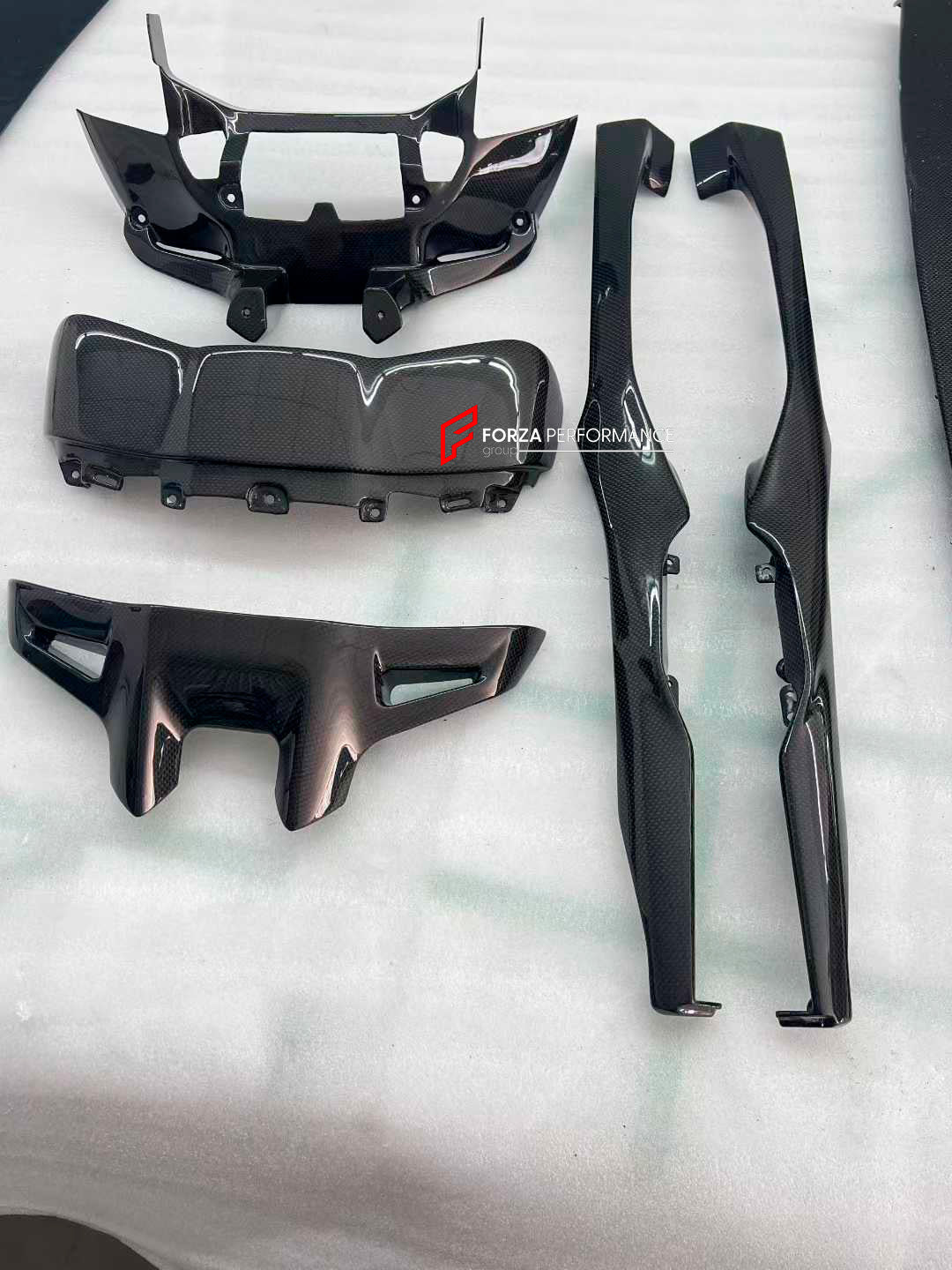 DRY CARBON REPLACEMENT INTERIOR KIT for FERRARI 296 GTS GTB

Set includes:

Dashboard Trims

Air Vent Trims
Central Console Trim

Material: Dry Carbon