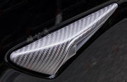 DRY CARBON SIDE CAMERA COVERS HALF COVERAGE for TESLA MODEL Y JUNIPER 2025+
Set includes:

Side Camera Covers (half coverage)
Material: Dry Carbon

NOTE: Add-on type - installs over the original part. Professional installation is required.