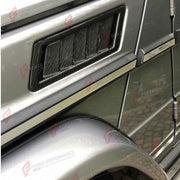 DRY CARBON SIDE FENDER VENTS for MERCEDES BENZ G WAGON W463 G500 G63 G65 G55 2004 - 2018 FORZA PERFORMANCE Custom Fit
Set includes:

Side Fender Vents
Material: Dry Carbon

NOTE: Professional installation is required.

Why “Contact Us for Pricing”?
We don’t display fixed prices because our goal is to offer you the most competitive deal possible. Product costs often decrease over time, and by requesting a quote, you’ll receive our most up-to-date price on market.

SECURED PAYMENT METHODS
PayPal (+4.4% fee)
V