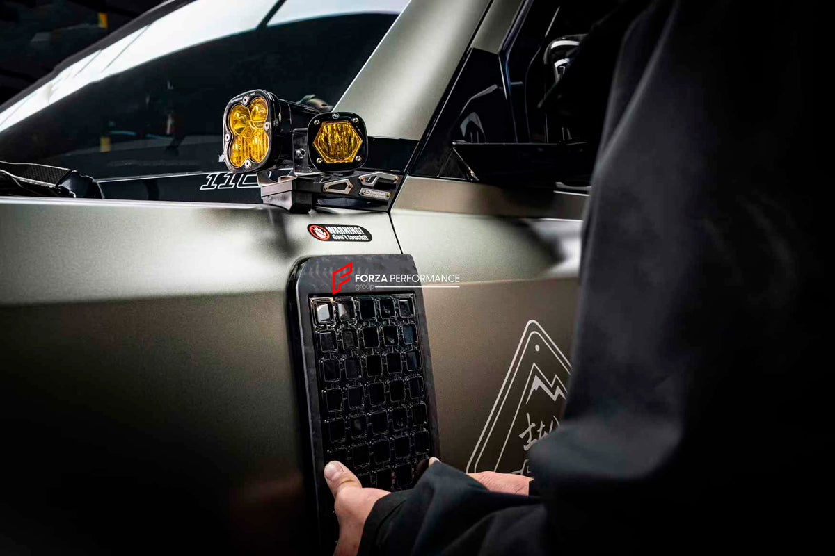 DRY CARBON SIDE FENDERS VENTS for LAND ROVER DEFENDER L663 2019+

Set includes:

Side Fenders Vents

Material: Dry Carbon

Note: Professional installation is required

Payment ►
Visa

Mastercard

PayPal with a credit card (add 4.4% at checkout)
Payoneer
Cryptocurrency
Shipment ►
By express DHL/UPS/TNT/FedEx
To the local international airport
Special line by air
Special line by the sea
To Europe and the UK by train

Please let us know which shipping option you prefer.