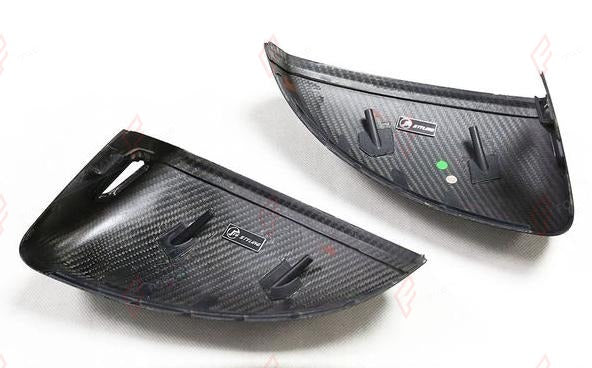 DRY CARBON SIDE MIRROR COVERS for AUDI R8 4S 2016 - 2023
Set includes:

Side Mirror Covers (with or without assist-sensor cutout - your choice)
Material: Dry Carbon

NOTE: Available with or without the driver-assist sensor cutout - specify your version when ordering. Fits R8 2016 - 22 and TT 2015 - 21. Professional installation is required.