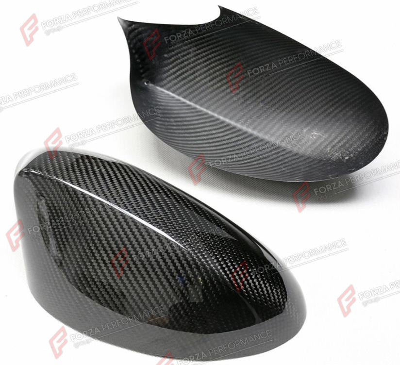 DRY CARBON SIDE MIRROR COVERS for BMW 1 SERIES E81 E87 E88 E82 PRE LCI 2007 - 2010
Set includes:

Side Mirror Covers
Material: Dry Carbon

NOTE: Add-on type - installs over the original mirror caps. Professional installation is required.
