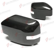 DRY CARBON SIDE MIRROR COVERS for FORD BRONCO 2021+
Set includes:

Side Mirror Covers
Material: Dry Carbon

NOTE: Available with or without the light cutout - specify when ordering. Add-on type - installs over the original part. Professional installation is required.