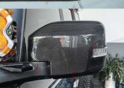 DRY CARBON SIDE MIRROR COVERS for FORD BRONCO 2021+
Set includes:

Side Mirror Covers
Material: Dry Carbon

NOTE: Available with or without the light cutout - specify when ordering. Add-on type - installs over the original part. Professional installation is required.