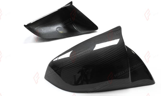 DRY CARBON SIDE MIRROR COVERS for TESLA MODEL S 2021+ M Style
Set includes:

Side Mirror Covers
Material: Dry Carbon

NOTE: Add-on type - installs over the original part. Professional installation is required.