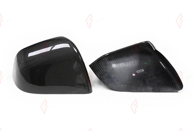 DRY CARBON SIDE MIRROR COVERS for TESLA MODEL Y 2020 - 2025
Set includes:

Side Mirror Covers
Material: Dry Carbon

NOTE: Add-on type - installs over the original part. Professional installation is required.