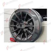 DRY CARBON SPARE WHEEL TIRE COVER for MERCEDES-BENZ G-CLASS W464 2019 - 2024 FORZA PERFORMANCE custom fit Vortex Style

Set includes:
Spare Wheel Tire Cover

Material: Dry Carbon

NOTE: Professional installation is required.